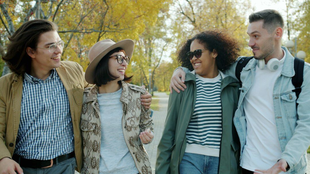 group of neighbors talking in park