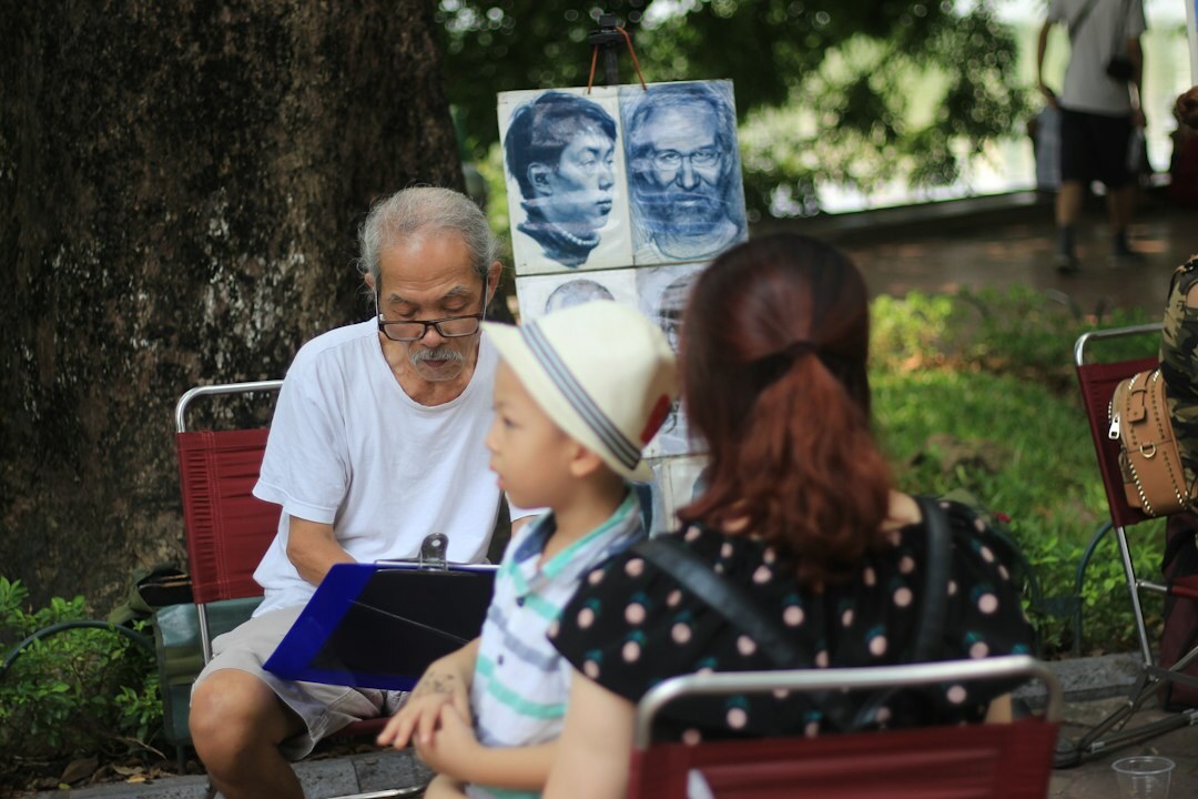 elderly looking at old photo album